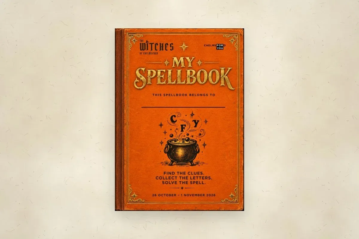 The orange Witches of Chelmsford My Spellbook cover with a cauldron, reading Find the clues, collect the letters, solve the spell